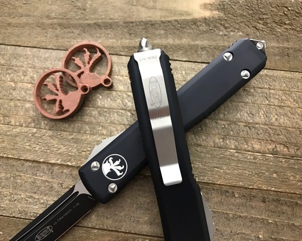 Нож Microtech Ultratech Black 123-1 с автоматическим открытием/закрытием клинка.