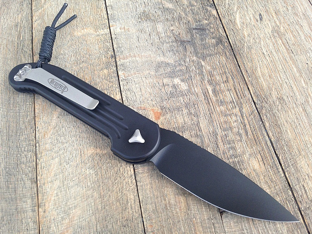 Нож Microtech LUDT 135-1 с автоматическим открытием клинка.
